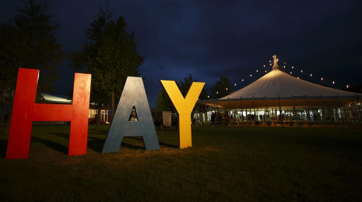 Hay Festival sign lit up at night