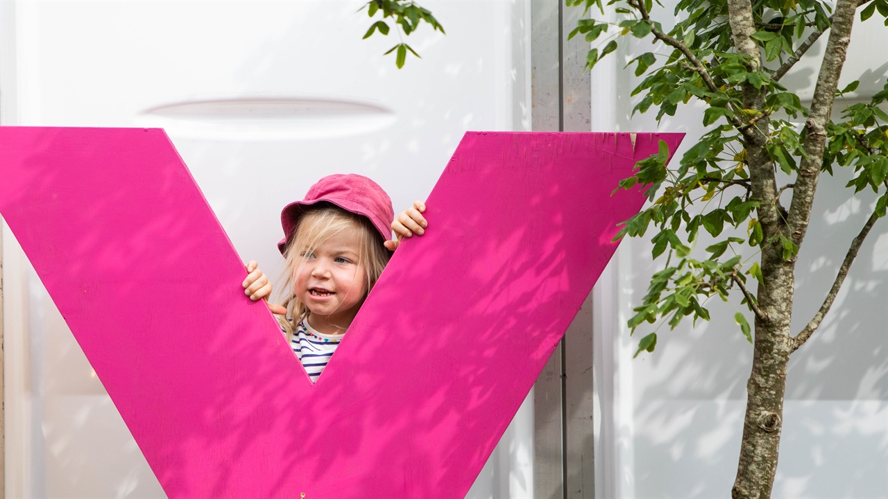 Child playfully hiding