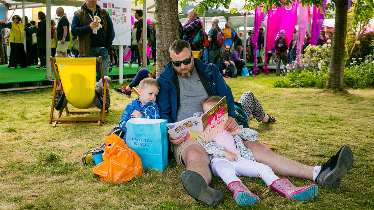 Family reading at festival