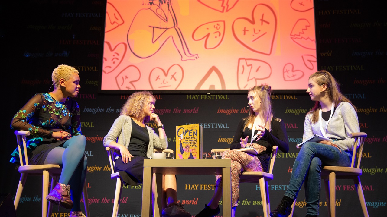 Jenny Valentine and Gemma Cairney with young people on stage at Hay Festival