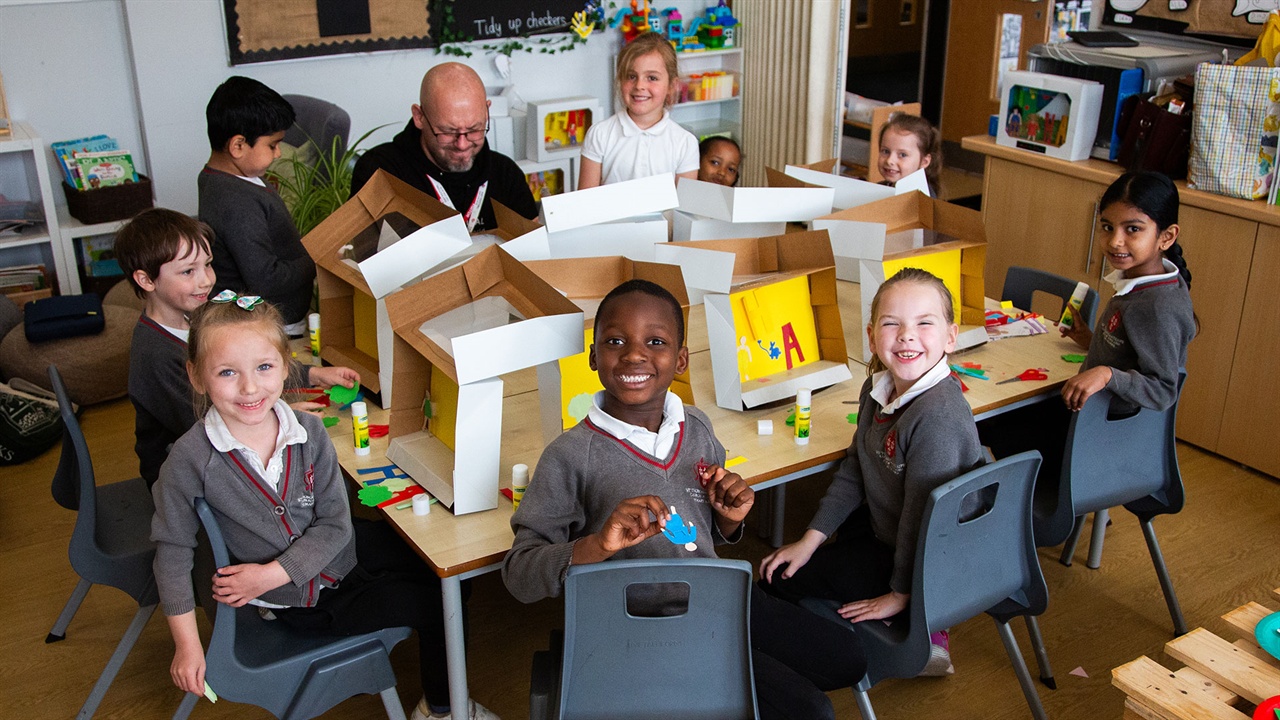 Children enjoying a Hay Festival crafting activity