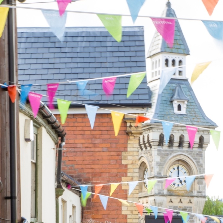 Bunting and clock tower in Hay on Wye