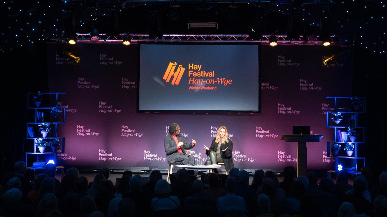 Carol Vorderman and David Olusoga onstage at hay Festival
