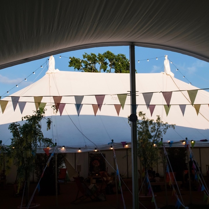 Hay Festival marquee, bunting and fairy lights
