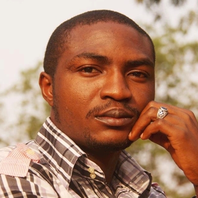 Abubakar Adam Ibrahim and H.J. Golakai talk to Georgina Godwin