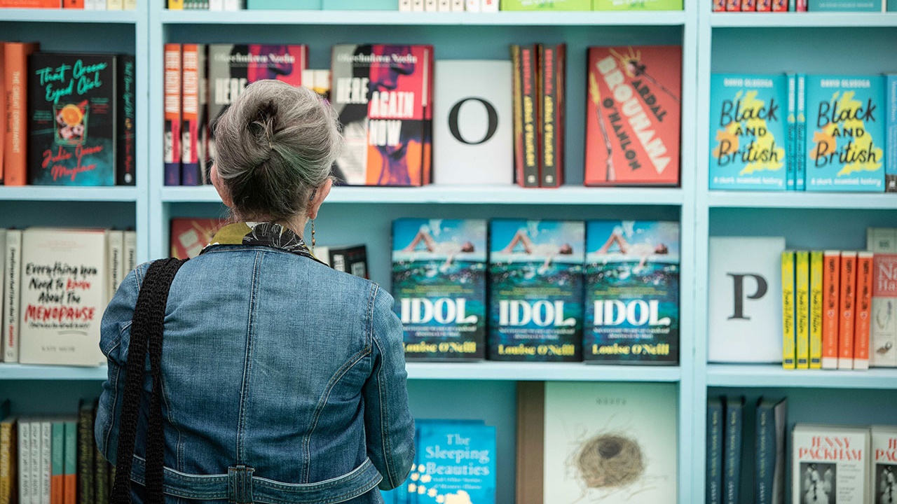Woman shopping for books