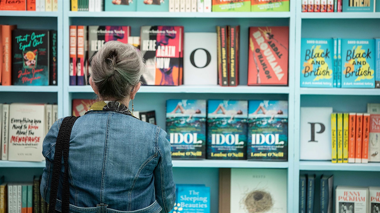 Woman book shopping at Hay Festival