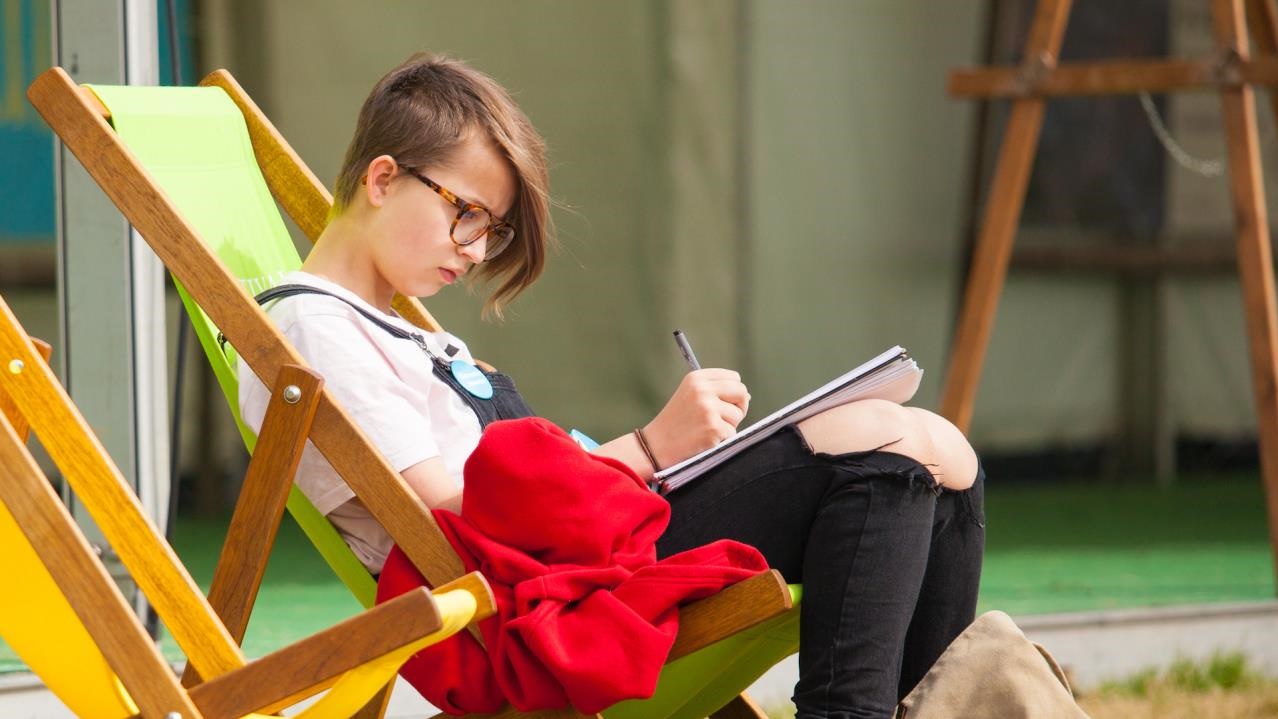 Writing in deckchair